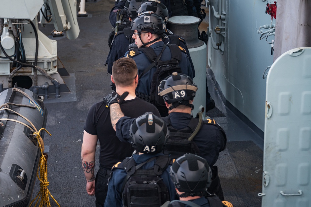 The Naval Boarding Party Team of Standing NATO Maritime Group One Flagship Her Majesty’s Canadian Ship Halifax conducts a self-boarding training serial off the coast of Portugal