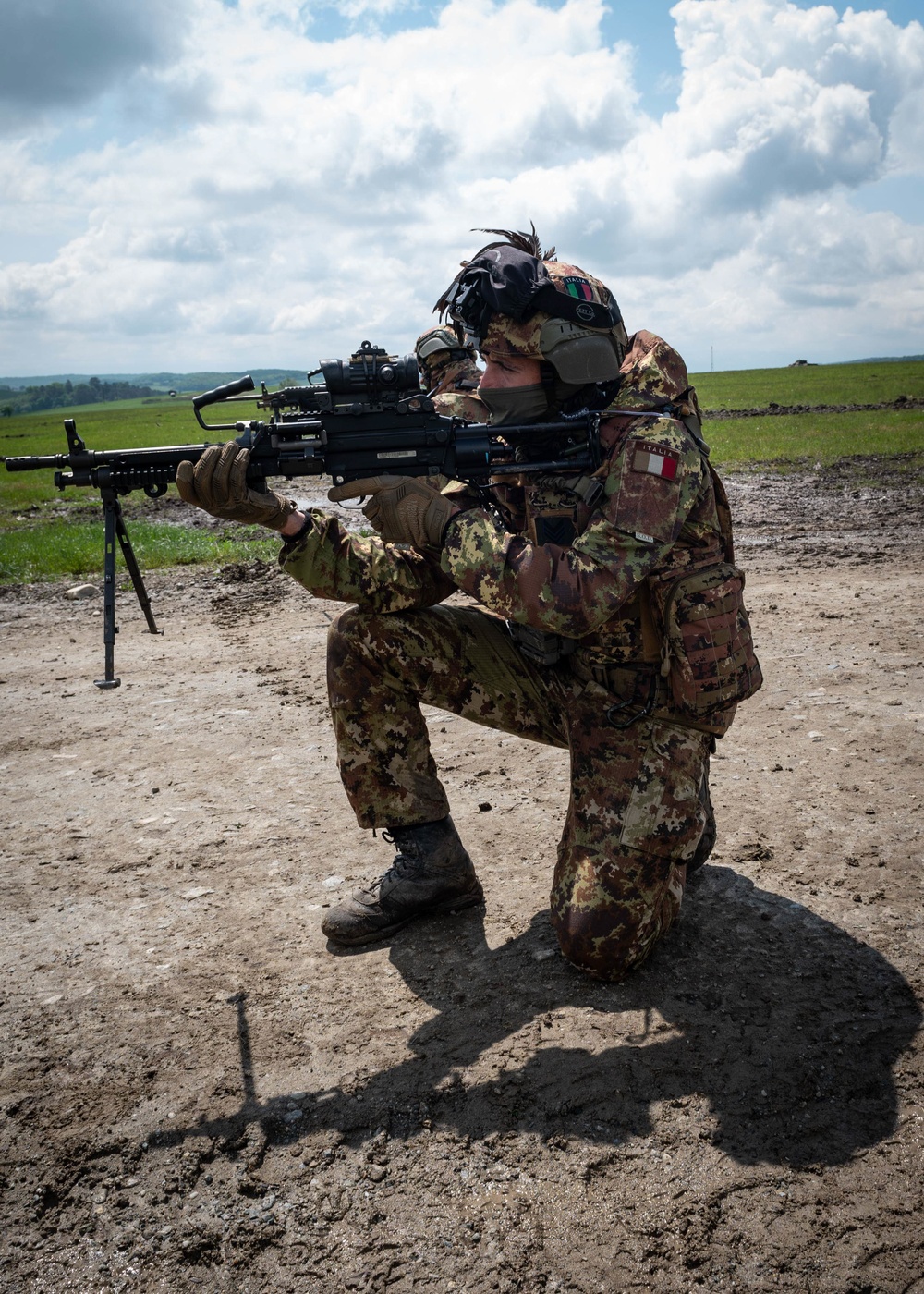 An Italian Soldier assigned to the 1st Mechanized Battalion ‘Bersaglieri’ hold their position while conducting reconnaissance training during Exercise Steadfast Defender 2021 in Romania.