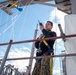 Sailor Works Aloft Aboard GHWB