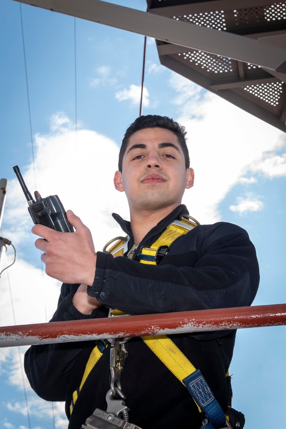 Sailor Poses Aloft Aboard GHWB