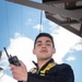 Sailor Poses Aloft Aboard GHWB