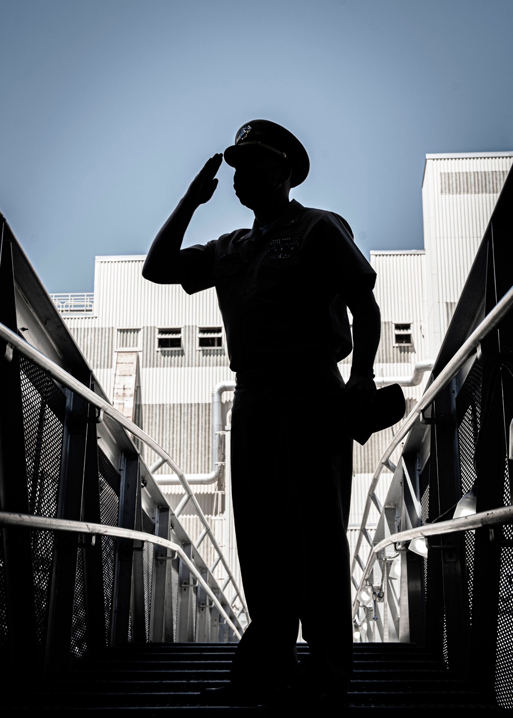 GHWB Sailor Salutes Ensign