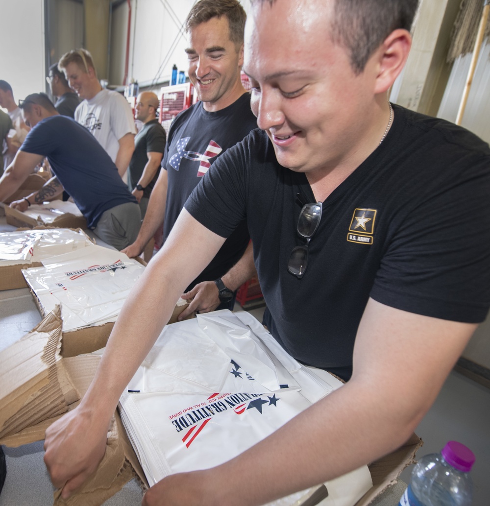 Troops Assemble Care Packages on Camp Lemonnier