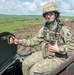 Romanian soldier from the Carpathian Eagles Battalion, operates an armoured vehicle while conducting tactical vehicle manoeuvring