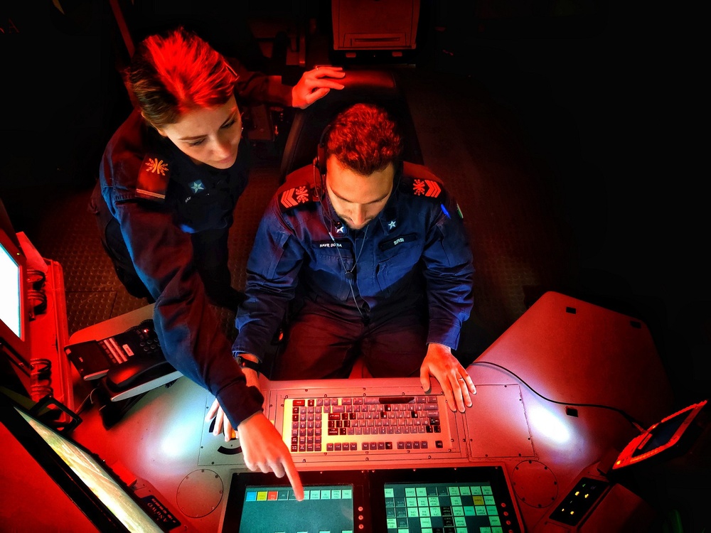 Two radar operators develop their skills by tracking aircraft targets on board ITS Andrea Doria (D553)