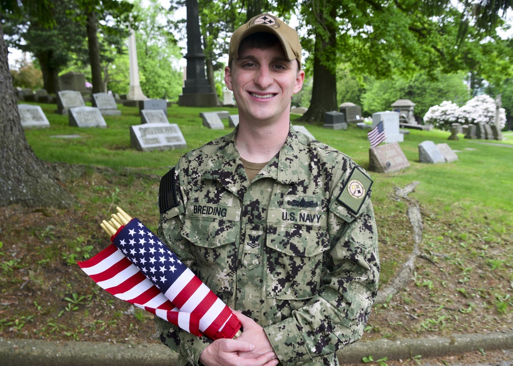 Sailors decorate cemetery for Memorial Day