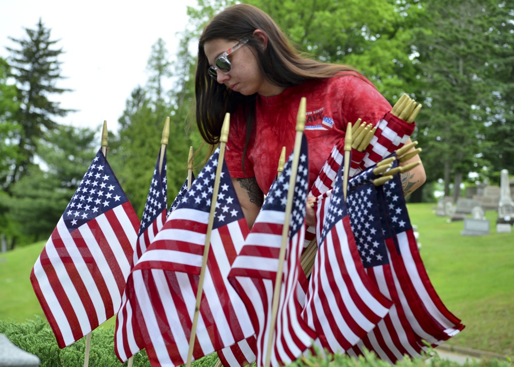 Sailors decorate cemetery for Memorial Day