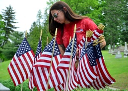 Sailors decorate cemetery for Memorial Day