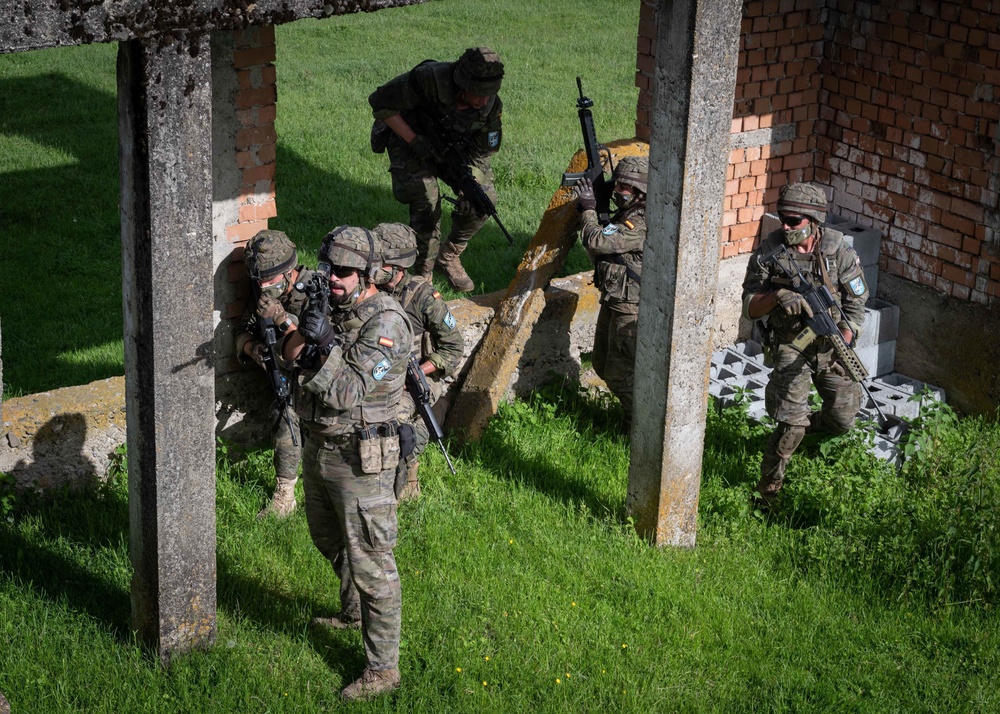 Spanish Soldiers assigned to the BRILAT Brigade conduct urban combat training during Exercise Steadfast Defender 2021