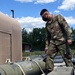 Airman First Class Carlos León secures a load at Joint Base Andrews