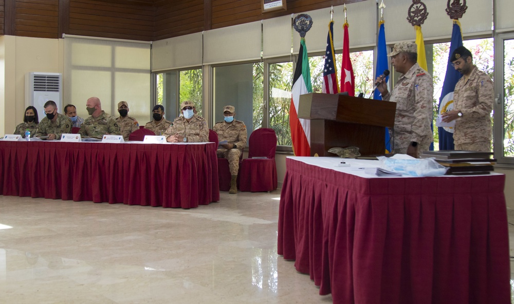 Kuwait Naval Forces and Task Force Spartan service members gather for legal symposium