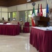 Kuwait Naval Forces and Task Force Spartan service members gather for legal symposium