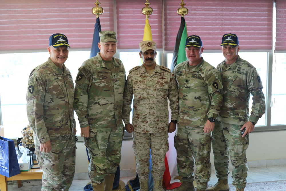 Task Force Spartan Leadership pose for picture with TF JAG and Kuwait Army Legal Officer after legal symposium
