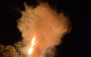 Explosion with cloud and flames during night operations at the Army's Joint Readiness Training Center Rotational Training