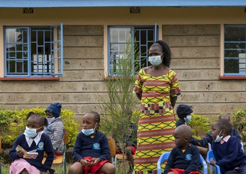 USAF Combat Aviation Advisors present school supplies to Moi Air Base students