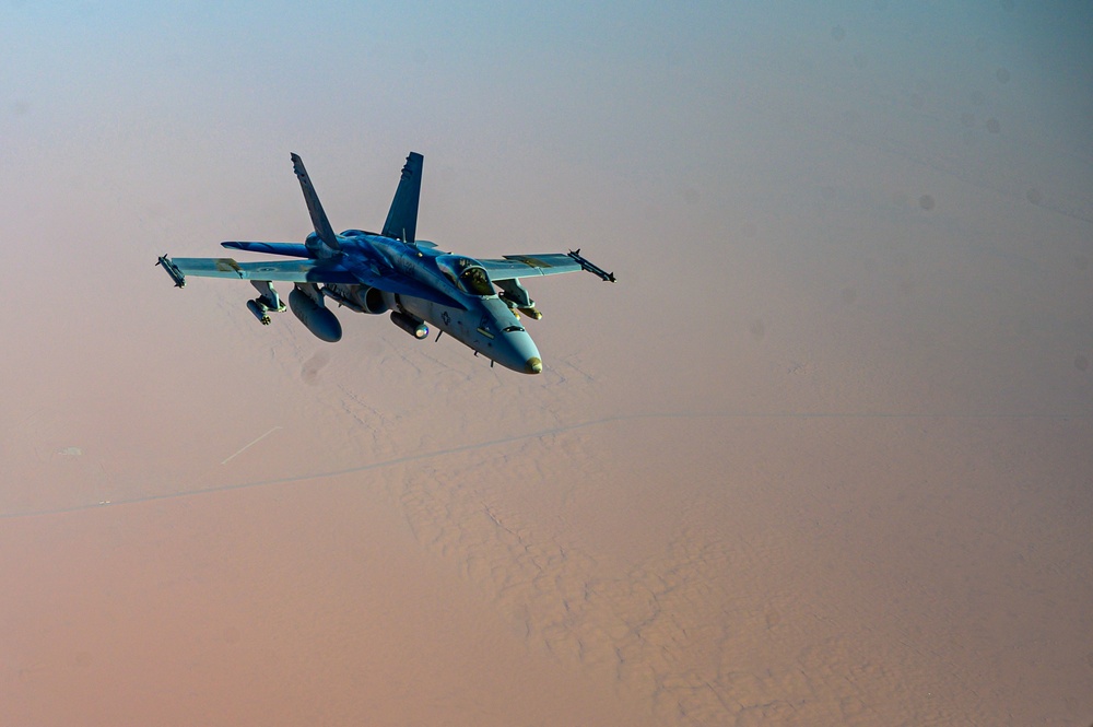 KC-135 Stratotanker Refuels F/A-18 Hornets