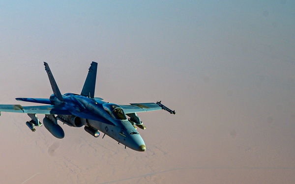 KC-135 Stratotanker Refuels F/A-18 Hornets