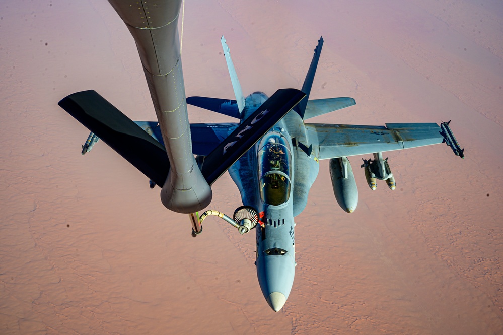 KC-135 Stratotanker Refuels F/A-18 Hornets