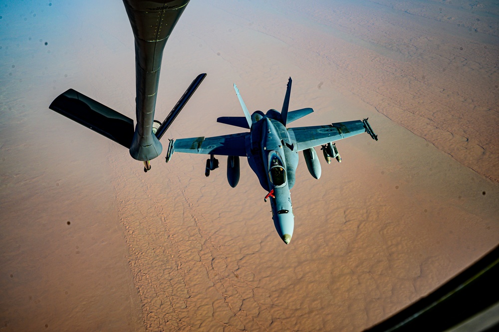 KC-135 Stratotanker Refuels F/A-18 Hornets