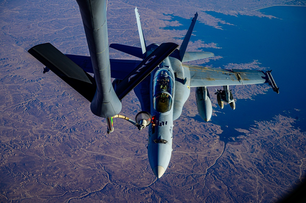 KC-135 Stratotanker Refuels F/A-18 Hornets