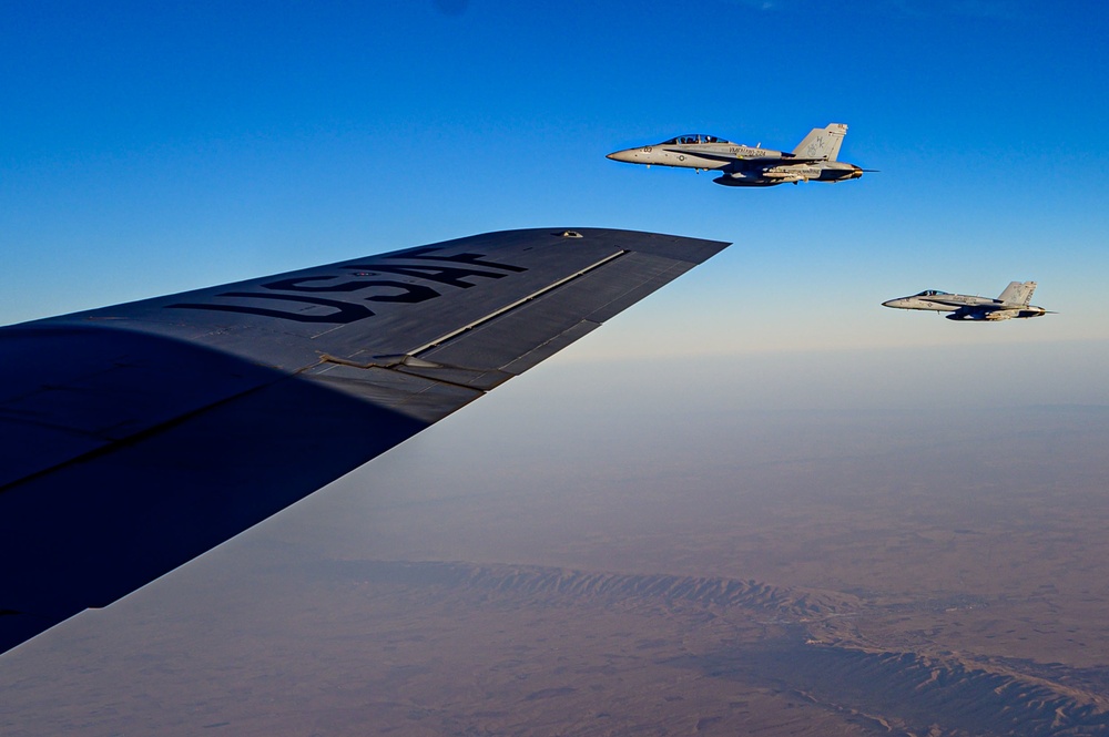 KC-135 Stratotanker Refuels F/A-18 Hornets