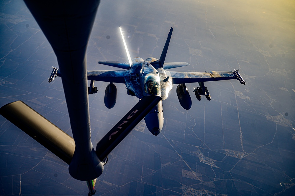 KC-135 Stratotanker Refuels F/A-18 Hornets