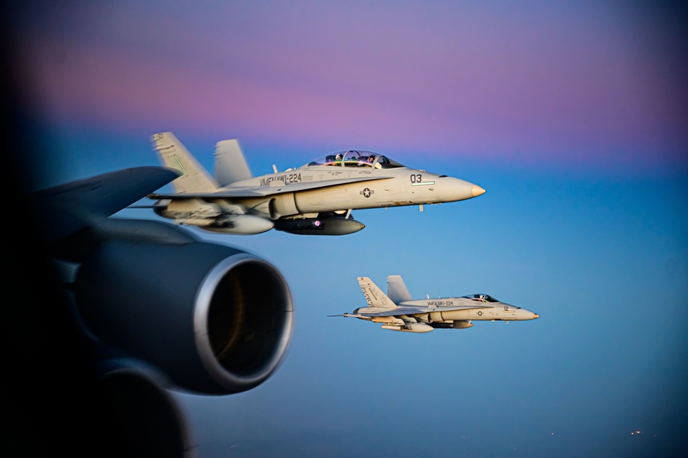 KC-135 Stratotanker Refuels F/A-18 Hornets