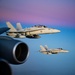 KC-135 Stratotanker Refuels F/A-18 Hornets