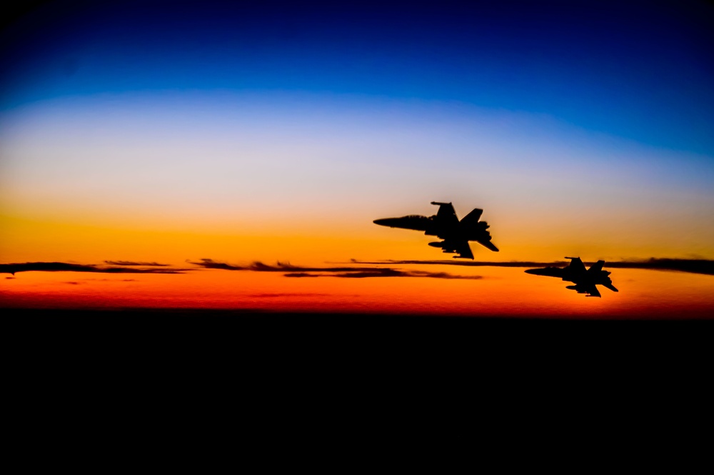 KC-135 Stratotanker Refuels F/A-18 Hornets