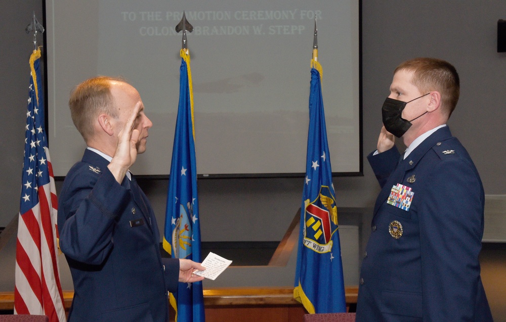 439th MSG commander pins on colonel