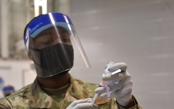184th Med Group administers COVID vaccinations for 184th Wing