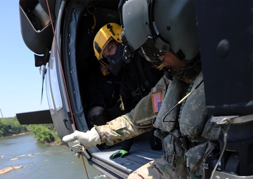 NC Guard and First Responders Helicopter Aquatic Rescue Team Training in Weldon North Carolina