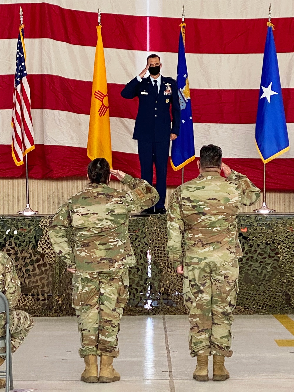 Colonel George Sefzik receives his first salute as the commander of the 150th Special Operations Wing