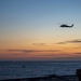 An MH-60 Sea Hawk helicopter fires on a target during a live fire exercise