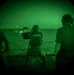 A Sailor fires a .50 Cal. Machine Gun on a target during a live fire exercise