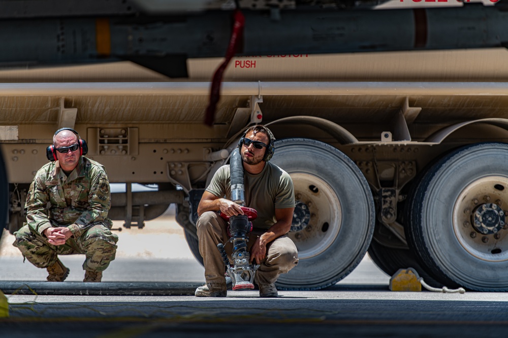 F-15E Strike Eagle Operators Chalk, Fuel and Check Their Jets