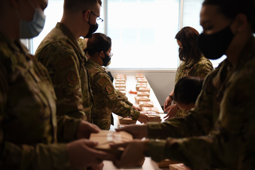 Sharing Food is Sharing Culture, 94th IS Airmen prepare traditional meal for Wingmen