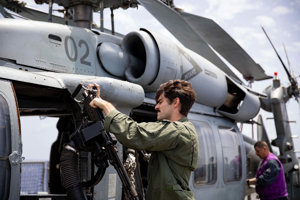 HSC 22 Sailor Conducts a Pre-Flight Check