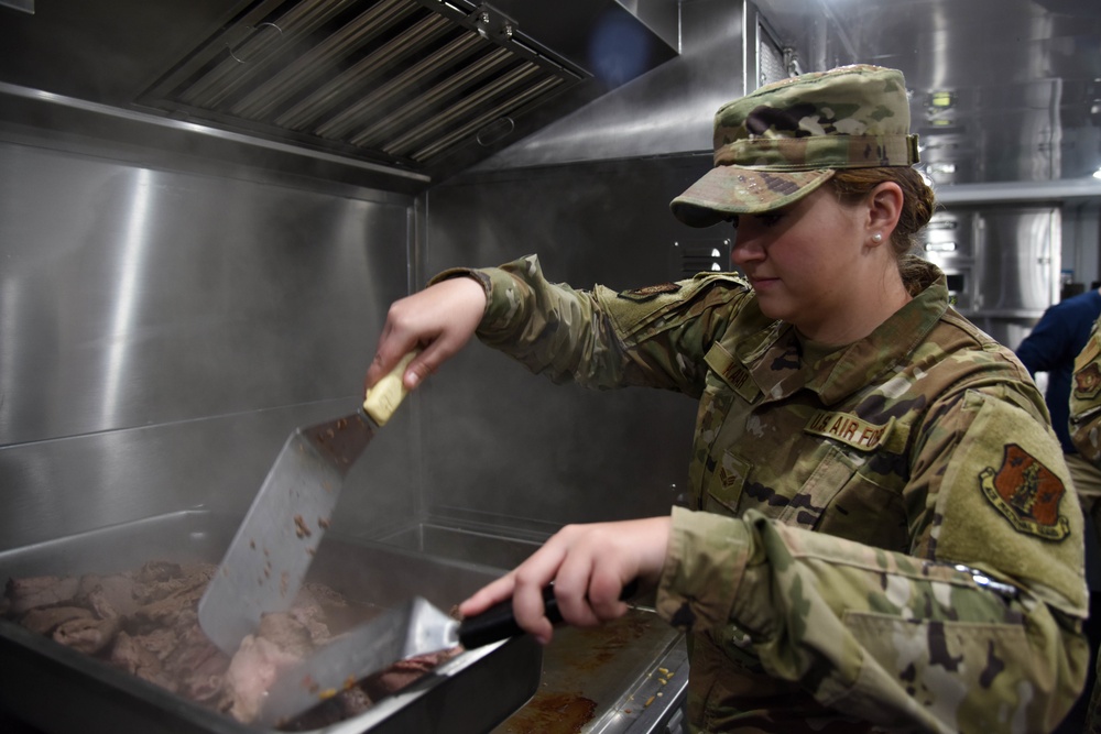 Members of the 114th Force Support Squadron and Babington Technology demonstrate Disaster Relief Mobile Kitchen Trailer (DRMKT) capabilities