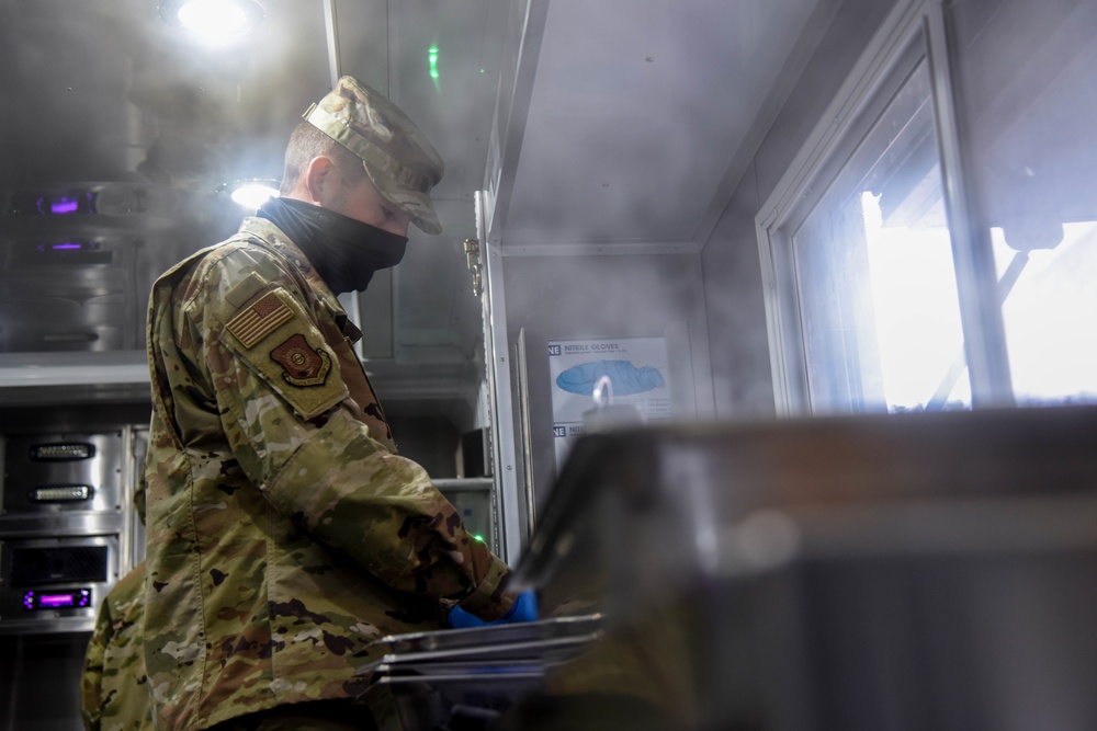 Members of the 114th Force Support Squadron and Babington Technology demonstrate Disaster Relief Mobile Kitchen Trailer (DRMKT) capabilities