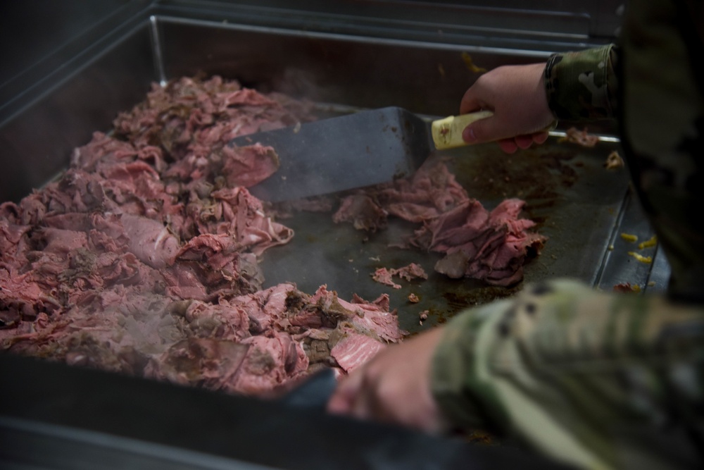 Members of the 114th Force Support Squadron and Babington Technology demonstrate Disaster Relief Mobile Kitchen Trailer (DRMKT) capabilities