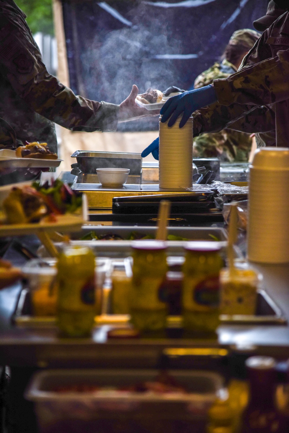 Members of the 114th Force Support Squadron and Babington Technology demonstrate Disaster Relief Mobile Kitchen Trailer (DRMKT) capabilities