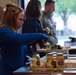 Members of the 114th Force Support Squadron and Babington Technology demonstrate Disaster Relief Mobile Kitchen Trailer (DRMKT) capabilities