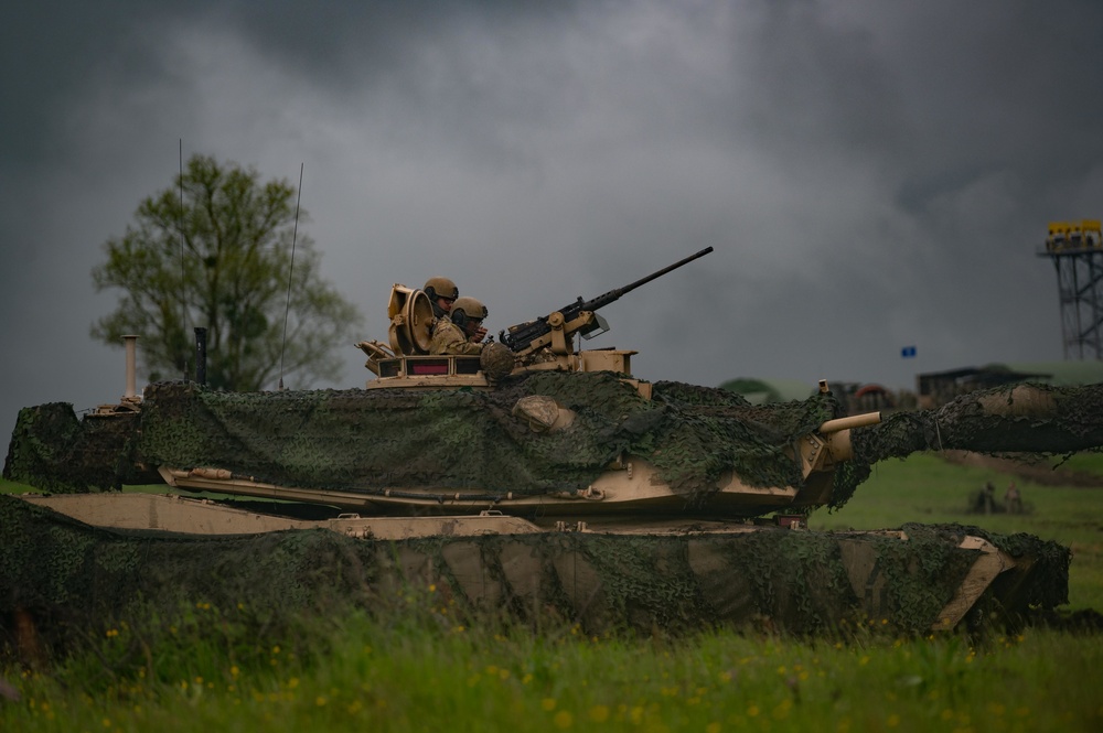 Soldiers assigned to US Army 3rd Platoon ‘C’ 25th Cavalry, drive a M1-A2 Abrams tank during a demonstration for NATO Exercise Steadfast Defender 2021
