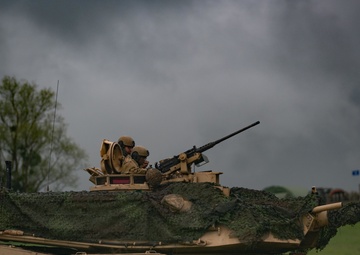 Soldiers assigned to US Army 3rd Platoon ‘C’ 25th Cavalry, drive a M1-A2 Abrams tank during a demonstration for NATO Exercise Steadfast Defender 2021