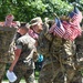 Service members place flags at Arlington National Cemetery