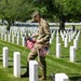 Service members place flags at Arlington National Cemetery