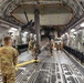Task Force Wolfpack offloads an AH-64 Apache from a U.S. Air Force C-17 Globemaster