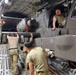 Task Force Wolfpack offloads an AH-64 Apache from a U.S. Air Force C-17 Globemaster