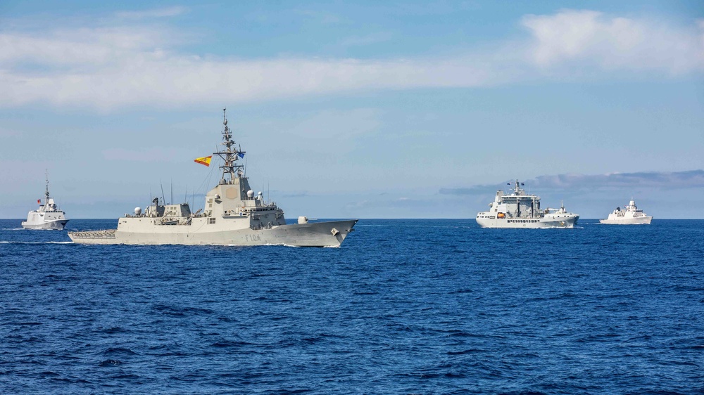 Multi-national ships sail in formation behind the Blue Ridge-class command and control ship USS Mount Whitney during Exercise Steadfast Defender 2021